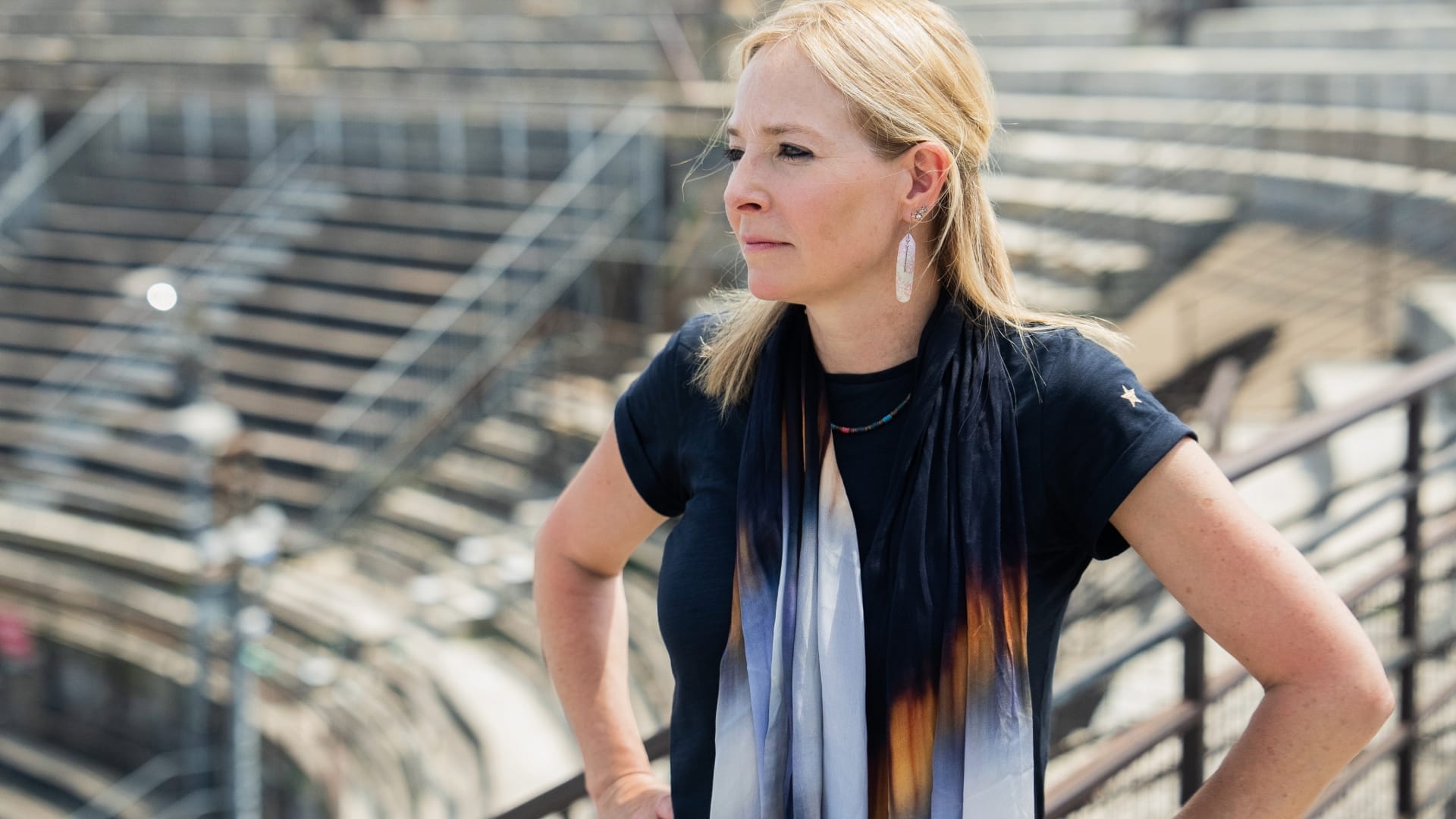 Alice Roberts stood in a Roman Amphitheatre